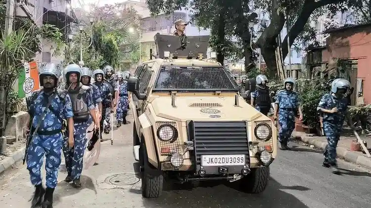 CRPF personnel conducting a flag march.