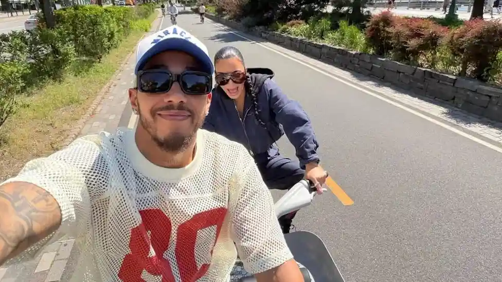 Kim Kardashian and Lewis Hamilton.