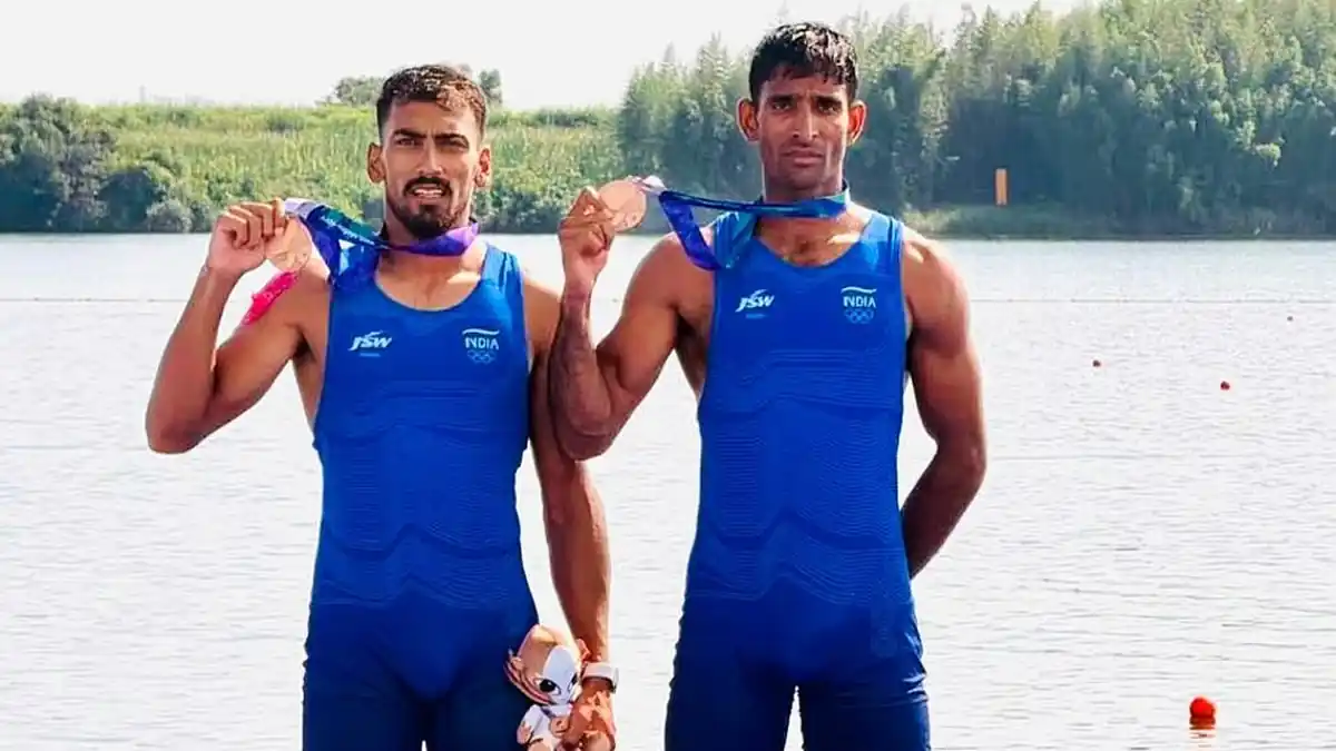 Satnam Singh (L) and Salman Khan celebrate their podium finish in Nagoya, Japan on Thursday
