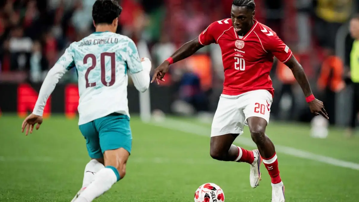 Portugal’s Joao Cancelo battles Denmark’s Mohamed Daramy for the ball during their UEFA Nations League Group A4 match at Parken Stadium in Copenhagen, October 1, 2026.