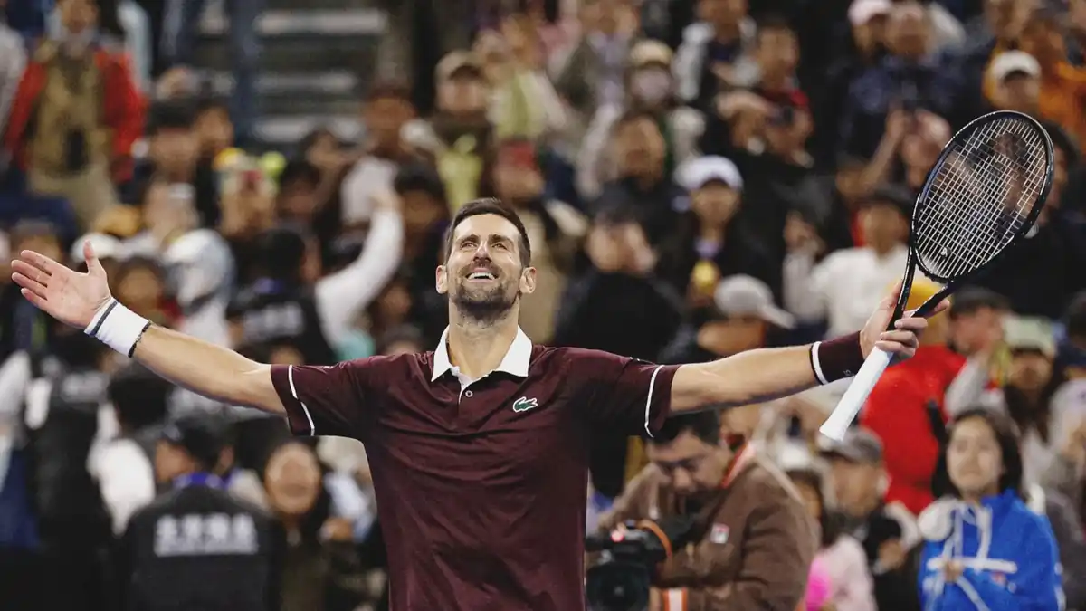 Djokovic celebrates after winning the match