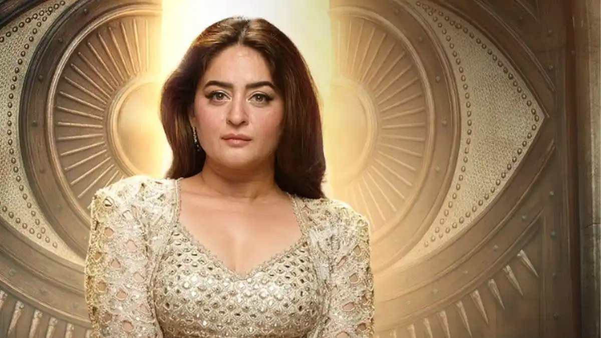 Mahhi Vij poses in an embellished gold outfit against an ornate golden circular backdrop.