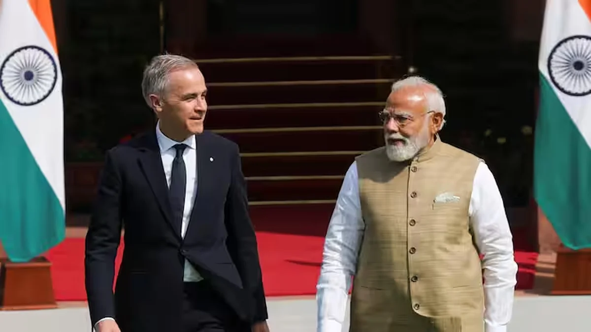 Canada's Prime Minister Mark Carney walks with his Indian counterpart, Narendra Modi, before their meeting at Hyderabad House in New Delhi, India, March 2, 2026.