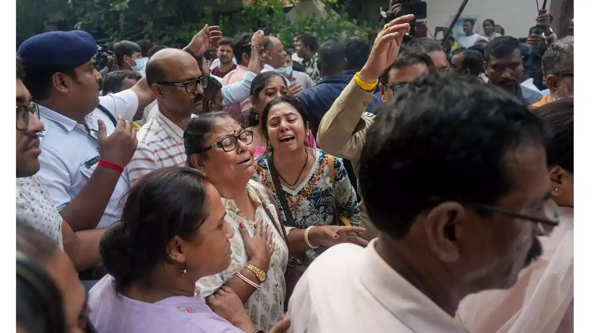 Families mourn the victims of a stampede at Kolkata’s Chorbagan Durga Puja pandal that killed 19 people and injured 25.