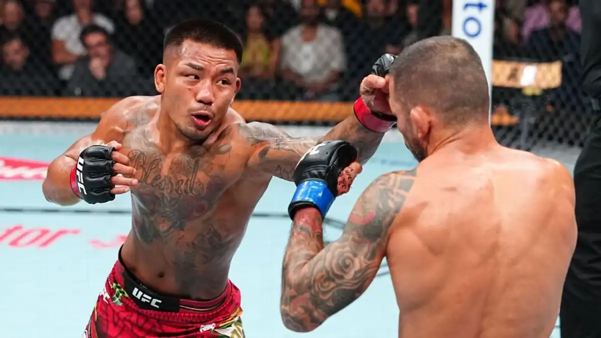 Joshua Van, left, beat Alexandre Pantoja, right, by unanimous decision to retain the UFC men's flyweight championship at UFC 331.