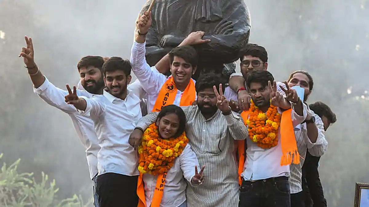 ABVP winners Yash Dabas, Riya Chhawadi, and Lakshya Raj Singh celebrate their victories in the DUSU polls in New Delhi on Sept. 19, 2026.