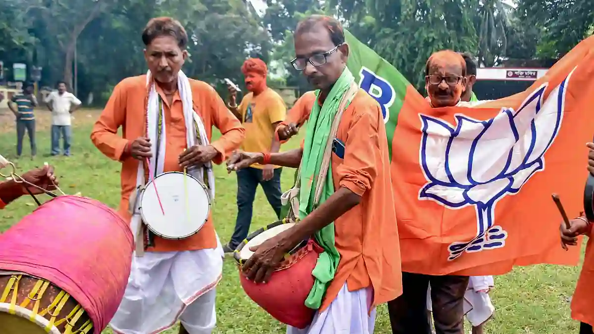 BJP supporters celebrate in Murshidabad, West Bengal, as the party leads in the Rejinagar and Nandigram by-elections.